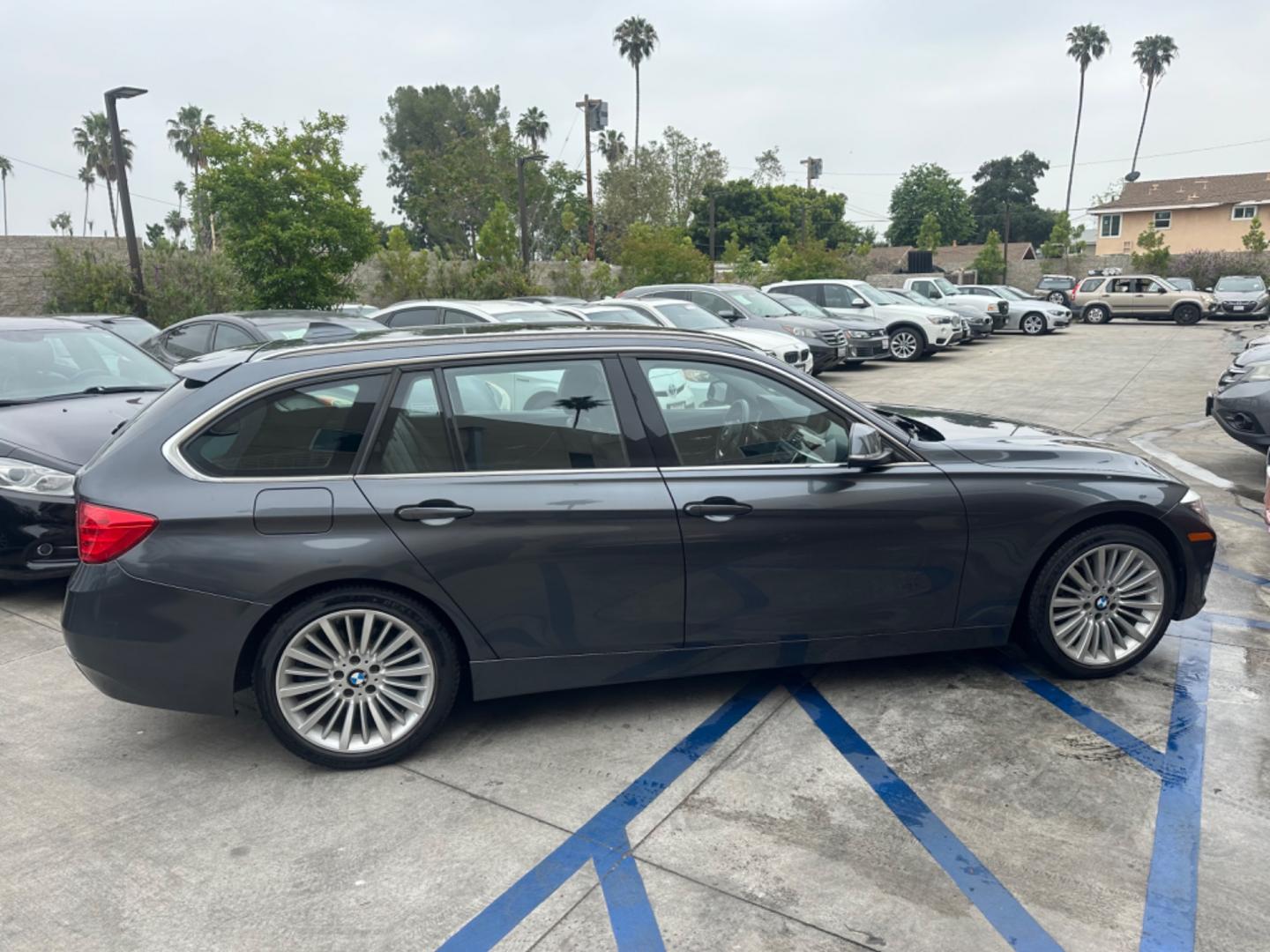 2014 Grey /Black BMW 3-Series Sport Wagon Leather (WBA3K5C53EK) with an 2.0 engine, Automatic transmission, located at 30 S. Berkeley Avenue, Pasadena, CA, 91107, (626) 248-7567, 34.145447, -118.109398 - Photo#5